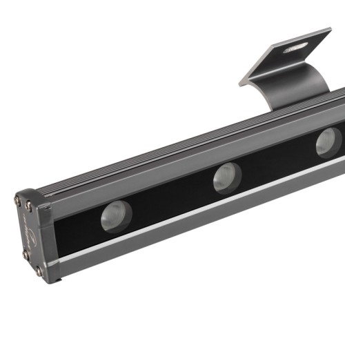Светодиодный прожектор AR-LINE-1000L-48W-24V RGB-Warm3000 (Grey, 15x45 deg, DMX512) (Arlight, Закрытый) Линейный светодиодный прожектор "WALLWASHER. Мощность 48W, напряжение питания DC 24V. Количество светодиодов 12 штук. Цвет светодиодов RGB-Warm(3000K) (4 кристалла в каждом светодиоде), управление по протоколу DMX512, угол рассеивания 15x45°. Корпус: алюминиевый сплав и армированное стекло. Цвет корпуса серый, степень влагозащиты IP65. Габариты 1000x105x54мм.